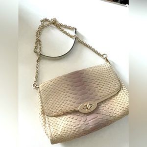 Used Coach beige crossbody bag with gold coloured chain strap clutch